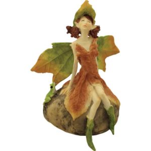 Fairy on Rock with Frog Statue