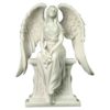 Angel With Roses Sitting On A Tombstone Statue