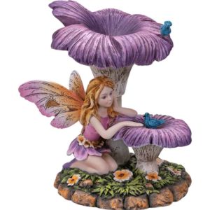 Fairy Sitting Under Flower Statue