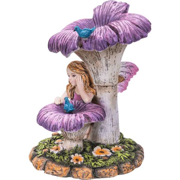 Fairy Sitting Under Flower Statue
