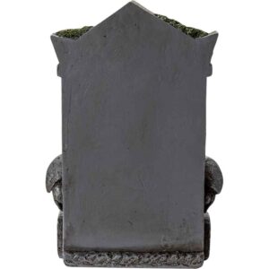 Overgrown Tombstone Statue